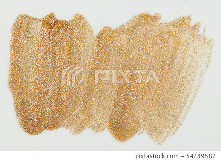 Sparkle gold color paint stain isolated Sparkle gold color paint stain isolated 54239582