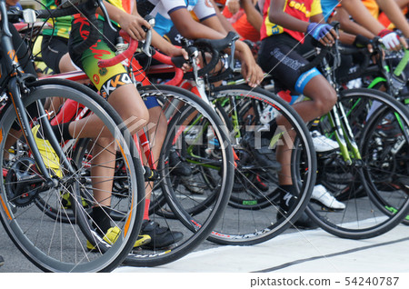 A group of boys with their racing bike. A group of boys with their racing bike. 54240787