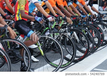 A group of boys with their racing bike. A group of boys with their racing bike. 54240789