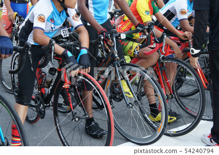A group of boys with their racing bike. A group of boys with their racing bike. 54240794