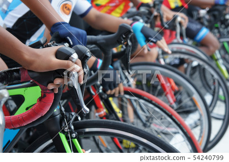A group of boys with their racing bike. A group of boys with their racing bike. 54240799