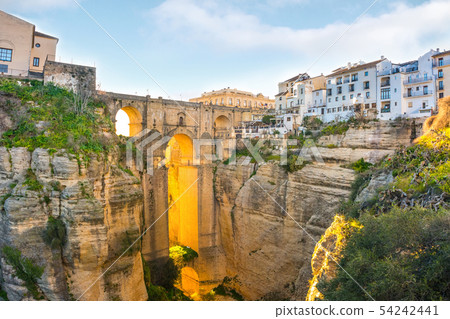 Ronda, Spain old town cityscape on the Tajo Gorge. Ronda, Spain old town cityscape on the Tajo Gorge. 54242441