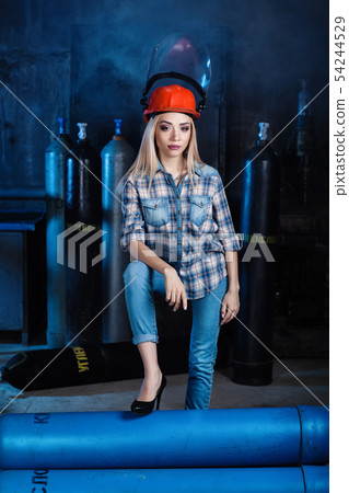 girl in a blue shirt red helmet girl in a blue shirt red helmet 54244529