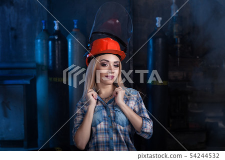 girl in a blue shirt red helmet girl in a blue shirt red helmet 54244532