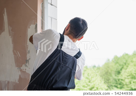Process male worker repairing window in a house Process male worker repairing window in a house 54244936