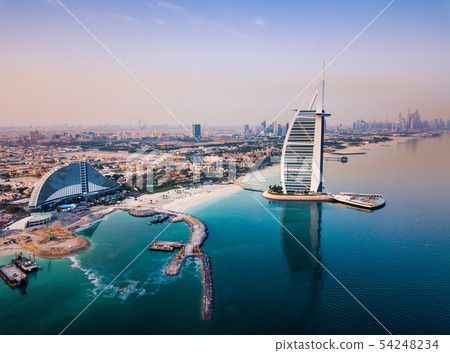 Burj Al Arab luxury hotel and Dubai marina skyline 54248234
