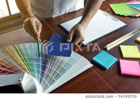 Graphic designer choose color band sample. 54249559