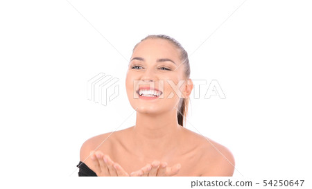 Beauty concept. The girl is waving greetings on a 54250647