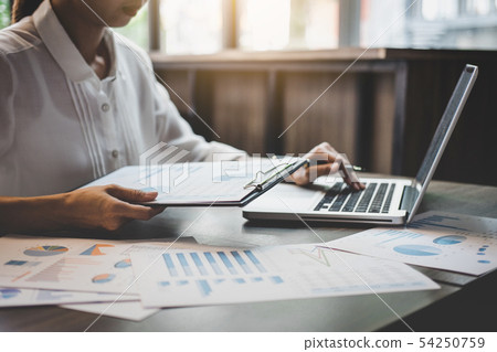 Professional at work, business woman working and Professional at work, business woman working and 54250759