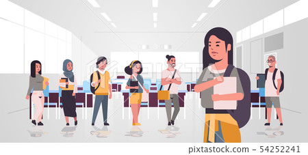mix race teenage students group with backpacks holding books standing together education concept 54252241