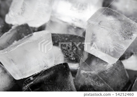 Ice cubes on a black background. Ice cubes on a black background. 54252460
