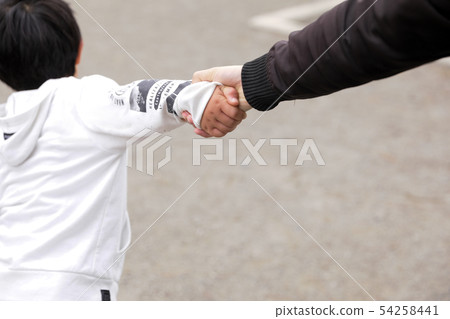 Man pulling dad's hand on the roadside, dad abuse Man pulling dad's hand on the roadside, dad abuse 54258441