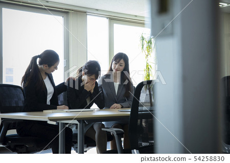 Crying ol and comforting colleague Crying ol and comforting colleague 54258830
