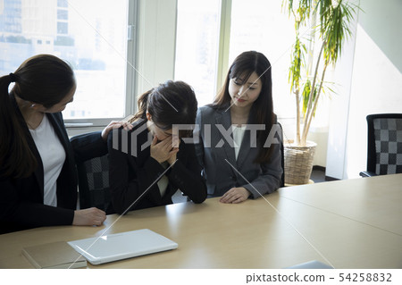 Crying ol and comforting colleague 54258832