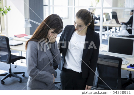 Crying ol and comforting colleague 54258951