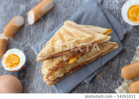 Pressed and toasted double panini with ham and Pressed and toasted double panini with ham and 54261011