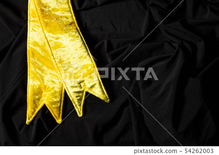 Yellow Velvet Winner Sash for Miss Pageant Beauty Contest, empty area for text winner country word, studio lighting abstract dark drapping textile background, Importance Decoration shoulder to waist Yellow Velvet Winner Sash for Miss Pageant Beauty Contest, empty area for text winner country word, studio lighting abstract dark drapping textile background, Importance Decoration shoulder to waist 54262003