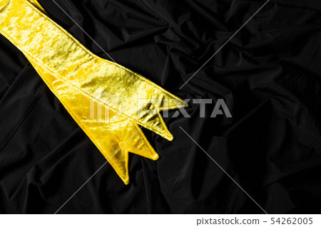 Yellow Velvet Winner Sash for Miss Pageant Beauty Contest, empty area for text winner country word, studio lighting abstract dark drapping textile background, Importance Decoration shoulder to waist Yellow Velvet Winner Sash for Miss Pageant Beauty Contest, empty area for text winner country word, studio lighting abstract dark drapping textile background, Importance Decoration shoulder to waist 54262005