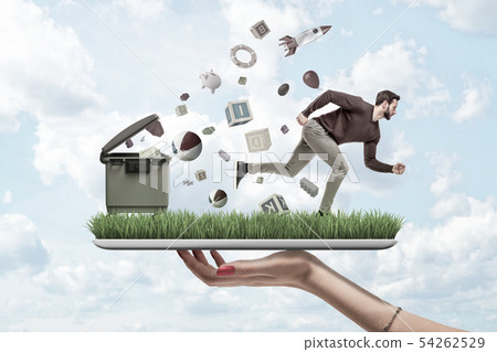 Woman's hand holding ipad with green grass growing on screen and man running from things flying out 54262529