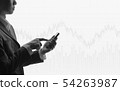 Business man using smartphone in stock market 54263987