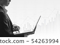 Business man using laptop in stock market 54263994