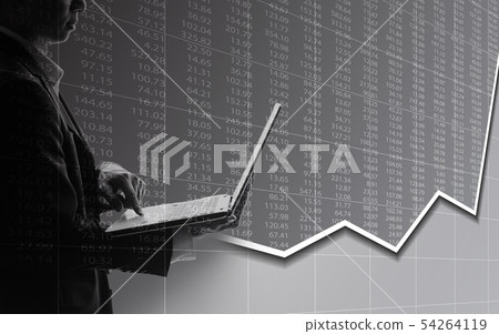 Business man using laptop in stock market 54264119