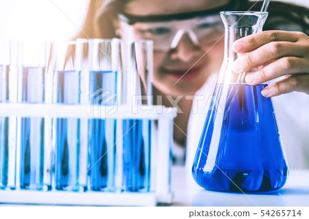 Scientist working in biochemistry laboratory. 54265714