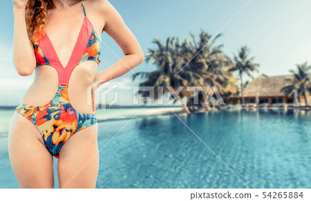 Happy young woman at beach in summer vacation. Happy young woman at beach in summer vacation. 54265884