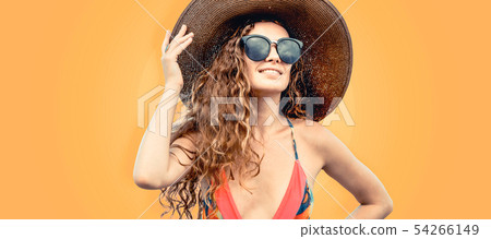 Woman in swimsuit posing on color background. Woman in swimsuit posing on color background. 54266149
