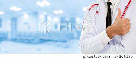 Young male doctor working at the hospital. Young male doctor working at the hospital. 54266156