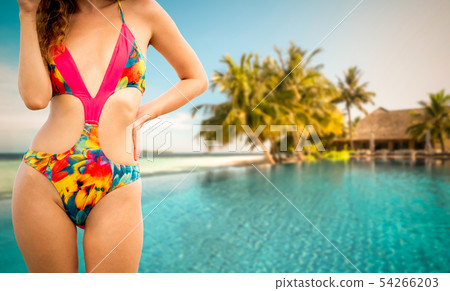 Happy young woman at beach in summer vacation. Happy young woman at beach in summer vacation. 54266203
