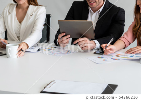 Businessman and businesswomen working in office. Businessman and businesswomen working in office. 54266210