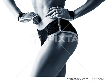 Athletic woman demonstrated her perfect muscular buttocks. Athletic woman demonstrated her perfect muscular buttocks. 54272660