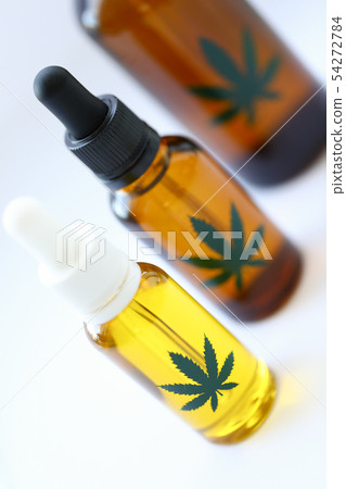 Pharmacy oil marijuana on a white background Pharmacy oil marijuana on a white background 54272784