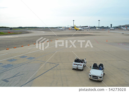 Tow tractor and airfield 54273028