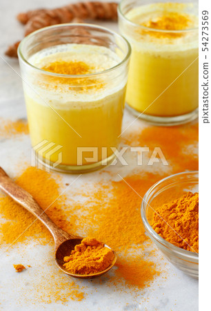 Golden milk with turmeric powder 54273569