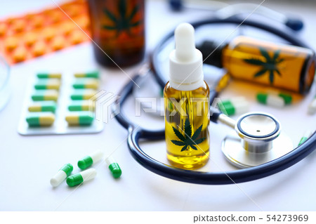 Marijuana stethoscope oil pills are on table Marijuana stethoscope oil pills are on table 54273969