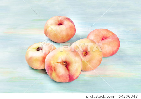 Vibrant organic flat saturn peaches on a teal background 54276348