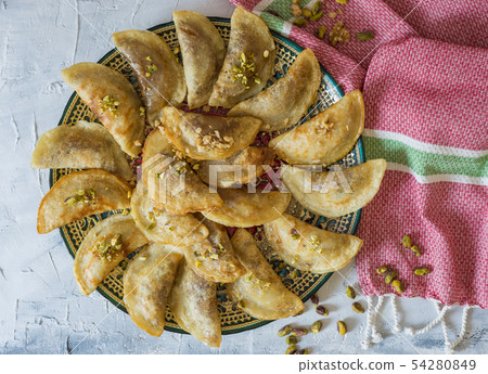 Arabic Traditional dessert Qatayef or Atayef  54280849