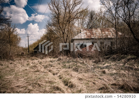 abandoned house in destroyed village of Kopachi Chernobyl zone, Ukraine abandoned house in destroyed village of Kopachi Chernobyl zone, Ukraine 54280910