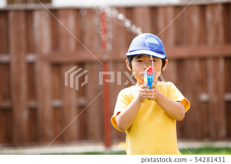Children boy garden play water gun 54281431