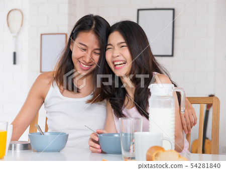 Happy asian lesbian woman couple have breakfast at 54281840