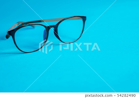 Glasses on a blue background 54282490