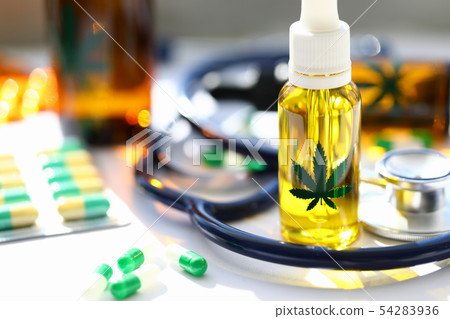 Marijuana stethoscope oil pills are on table Marijuana stethoscope oil pills are on table 54283936