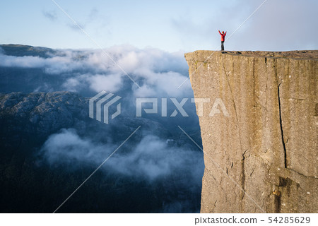 Girl on the Rock Preikestolen, Norway 54285629