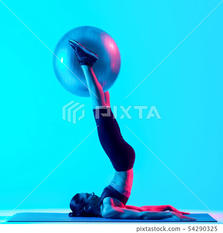 woman exercsing fitness pilates exercices isolated woman exercsing fitness pilates exercices isolated 54290325