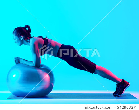 woman exercsing fitness pilates exercices isolated 54290327