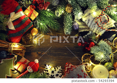 Top view of festive frame with socks, gifts Top view of festive frame with socks, gifts 54293394