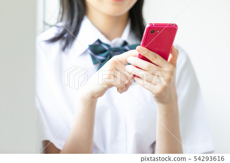 High school girl smartphone hand High school girl smartphone hand 54293616