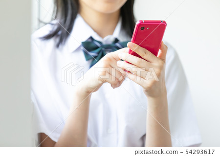 High school girl smartphone hand 54293617